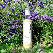 Load image into Gallery viewer, Kavana's non-toxic, clean skincare, powered by a blend of five plants , a.k.a 'Phyto-5, (calendula, comfrey, echinacea, plantain and rosehip seed oil), provides an ultra-gentle, calming and soothing, makeup removing experience. This effective yet gentle cleansing milk, takes off hard to remove, waterproof eye makeup like mascara and liquid eyeliner. A pump top, glass bottle is sleek and easy to use.