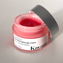 Load image into Gallery viewer, Rose Moon Glow Gel Cream is a lightweight primer and moisturizer, 2-in-1. Pictured here, the open jar with a brushed, matte silver coloured cap, perched on the lip of the jar. Another jar flipped on it's side, cane be seen, the pink colour of the gel showing through it. This gel goes on clear on the skin, leaving now colour behind.