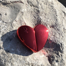 Load image into Gallery viewer, Clean, safe, non-toxic fragrance at it's best! Packaged in a refillable, recyclable cherry red and reflective, aluminum heart-shaped glass bottle, this gourmand fragrance is an ode to love. The combination of aphrodisiac essential oils and warm, full bodied resins of tonka bean , benzoin and ylang ylang, topped with a refreshing citrus note of lemon, LEV makes for an original scent that is one-of a kind. Lev is seductive, sophisticated, simple and sweet all at once.