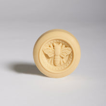 Load image into Gallery viewer, Natural, non-toxic, aluminum-free, synthetic fragrance free / perfume free, paraben free & pthalate-free, KAVANA's 'Eco-Deo' is a truly eco-friendly deoderant. Free of plastic packaging, this round deoderant bar, fits in the palm of your hand for easy use.  It's clean,  safe and really works to keep you dry and smelling fresh! Great if you're expecting, have sensitive skin, just want to detox from conventional deoderants. Contains ti-tri and lemongrass essential oils.