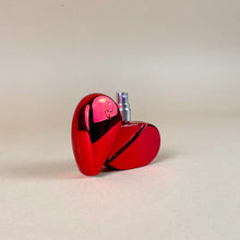 Load image into Gallery viewer, Clean, safe, non-toxic fragrance at it's best! Packaged in a refillable, recyclable cherry red and reflective, aluminum heart-shaped glass bottle, this gourmand fragrance is an ode to love. The combination of aphrodisiac essential oils and warm, full bodied resins of tonka bean , benzoin and ylang ylang, topped with a refreshing citrus note of lemon, LEV makes for an original scent that is one-of a kind. Lev is seductive, sophisticated, simple and sweet all at once.