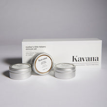 Load image into Gallery viewer, The perfect gift for new or expecting moms and babies, this trio of clean, non-toxic, mom and baby safe balms, is formulated with all natural ingredients, that help support moms and babies tender skin. The Stretchy Belly Balm, Nursing Mom Nipple Balm and Baby Bum Balm, are unscented and easy to identify in clearly labelled, round tins. The three tins come in an elegant, rectangular white box with a magnetic closure, an elegant and perfect gift for new mothers!