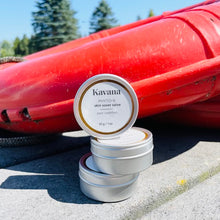 Load image into Gallery viewer, Kavana's skin saving salve to the rescue! Packed with Tamanu Nut seed oil and Sea Buckthorn seed oil, this is one  powerhouse of a Kavana Skincare salve to take with you on every summer camping trip!