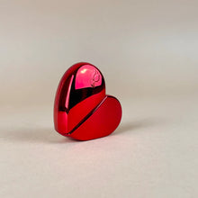 Load image into Gallery viewer, Clean, hormone safe, non-toxic fragrance at it's best! Packaged in a refillable, recyclable cherry red and reflective, aluminum heart-shaped glass bottle, this gourmand fragrance is an ode to love. The combination of aphrodisiac essential oils and warm, full bodied resins of tonka bean , benzoin and ylang ylang, topped with a refreshing citrus note of lemon, LEV makes for an original scent that is one-of a kind. Lev is seductive, sophisticated, simple and sweet all at once.