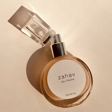 Load image into Gallery viewer, Kavana's Zahav, Eau fraiche, is a handmade, non-toxic light fragrance with a hint of golden shimmer. Perfect for a summer hair spritz to add shine and delicious scent to the hair. It's an updated nod to classic Eau de Cologne- a fresh and sophisticated citrus bouquet, blended with white flowers of neroli and orange blossom. An intoxicating and heady blend.