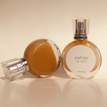 Load image into Gallery viewer, Kavana's Zahav, Eau fraiche, is a handmade, non-toxic light fragrance with a hint of golden shimmer. Perfect for a summer hair spritz to add shine and delicious scent to the hair. It's an updated nod to classic Eau de Cologne- a fresh and sophisticated citrus bouquet, blended with white flowers of neroli and orange blossom. An intoxicating and heady blend.