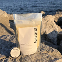 Load image into Gallery viewer, Start Sunday off right by making time for self-care. A decadent, aromatherapeutic experience, KAVANA Sunday Salt Soak's signature blend of salts, exhilarating and revitalizing citrus essential oils, herbs and orange zest, will rejuvenate your skin and your senses.