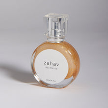 Load image into Gallery viewer, Kavana's Zahav, Eau fraiche, is a handmade, non-toxic light fragrance with a hint of golden shimmer.  Perfect for a summer hair spritz to add shine and delicious scent to the hair.  It's an updated nod to classic Eau de Cologne- a fresh and sophisticated citrus bouquet, blended with white flowers of neroli and orange blossom. An intoxicating and heady blend.