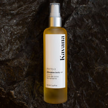 Load image into Gallery viewer, Get satiny soft skin with a fresh, spa-like scent with Kavana's fast-absorbing, lightweight, dry-touch Afterglow Body Oil. Non-toxic and all natural, it's powered by Kavana's PHYTO-5 blend of wildcrafted calendula, comfrey, echinacea plantain and a Chilean rosehip seed oil in a sunflower & rice bran oil blend, moisturizes, protects, soothes and heals chapped, neglected, winter skin. Best used right after a bath or shower to seal moisture in with no greasy after fell!