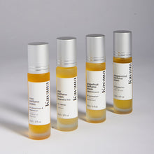 Load image into Gallery viewer, Kavana's Peppermint Perfume Poem is aromatherapy in a roll on. This therapeutic, non-toxic fragrance blend of peppermint, rosemary, basil and grapefruit, help support PMS headache relief in a convenient purse size, perfume roll-on. Apply to back of neck, temples, wrists, collar bone and even soles of feet and inhale deeply. Kavana's Perfume Poem collection is hormone safe and non-toxic, created with essential oils and plant based oils. Re-apply as needed throughout the day or night.
