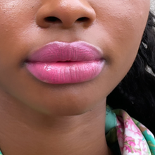 Load image into Gallery viewer, Kavana&#39;s Phyto-5 Tinted Lip Treatment oil in Eglantine, a bright fucshia, with blue undertones. The bottle sits atop a love note that says &#39;mon amour&#39; with a bright fuschia kiss mark on it!
