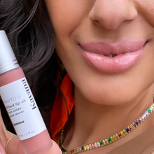 Load image into Gallery viewer, Model Kristel is wearing Gamine- a pale English rose- neutral tint- part of Kavana&#39;s Phyto-5 TInted LIp oil collection.
