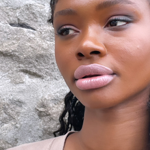 Load image into Gallery viewer, Raissa is seen wearing Gamine- a pale rose tint in Kavanas Phyto-5 TInted LIp oil collection.
