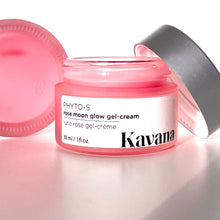 Load image into Gallery viewer, Rose Moon Glow Gel Cream is a lightweight primer and moisturizer, 2-in-1. Pictured here, the open jar with a brushed, matte silver coloured cap, perched on the lip of the jar. Another jar flipped on it&#39;s side, cane be seen, the pink colour of the gel showing through it. This gel goes on clear on the skin, leaving now colour behind. 

