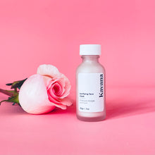 Load image into Gallery viewer, Kavana&#39;s Purifying Face Mask bottle, seen here, upright, against a pink background and a fresh rose, lying to it&#39;s side.
