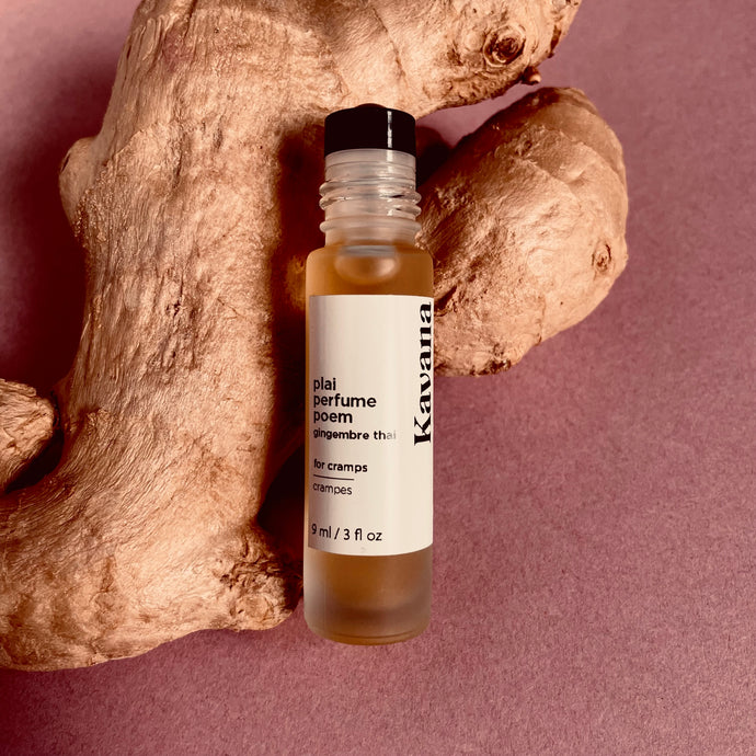 PMS cramps got you down? Find support with this Plai (Thai Ginger) roll on. Try Kavana's powerful Perfume Poem blend, including Plai (Thai ginger) and Marjoram essential oils, to help ease the pain of monthly cramps.  Seen in this photo: a roller ball on rosted glass bottle 10ml, with a matte silver cap, resting on a large piece of fresh ginger.