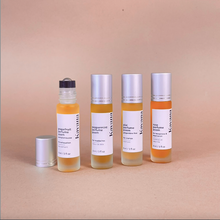 Load image into Gallery viewer, PMS Perfume Quattro: 4 botanical, aromatherapy fragrance oil blends in convenient roll-ons. 100% non-toxic and hormone safe, clean perfume. Handmade with certified pure, therapeutic grade essential oils.
