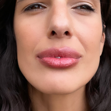 Load image into Gallery viewer, Model Kristel wears Kavana&#39;s Phyto-5 Tinted Lip Oil in Seraphine- a sheer butterscotch brown with orange undertones. Absolutely gorgeous!
