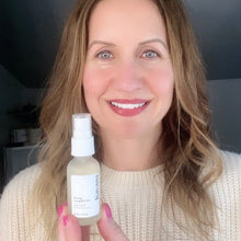 Load image into Gallery viewer, Woman seen holding Kavana&#39;s liquid moisturizing, non-toxic, flower powered, hormone safe Reviving Rose Glow mist before applying her moisturizer (Kavana&#39;s Phyto-5 Face Cream).

