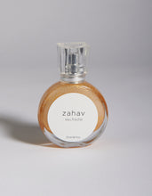Load image into Gallery viewer, Kavana&#39;s Zahav, Eau fraiche, is a handmade, non-toxic light fragrance with a hint of golden shimmer.  Perfect for a summer hair spritz to add shine and delicious scent to the hair.  It&#39;s an updated nod to classic Eau de Cologne- a fresh and sophisticated citrus bouquet, blended with white flowers of neroli and orange blossom. An intoxicating and heady blend.

