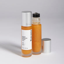 Load image into Gallery viewer, A shimmering gold, therapeutic perfume roll on, Kavana&#39;s Neroli Calm Blend, is a light, citrus and white flower fragrance that can help calm anxiety, and increase positive feelings. A must-have purse fragrance. Essential oils of Neroli, tangerine, petitgrain bigarade, sweet orange and bergamot blend beautifully in meadowfoam and rice bran oil for a long-wearing, lightly moisturizing, skin friendly fragrance. A soft golden shimmering mica, leaves a shimmer on the skin after applying it. 
