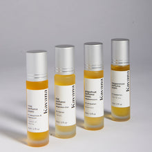 Load image into Gallery viewer, Kavana Perfume Poems are therapeutic fragrances, conceived for different symptoms of PMS. Left-right: Neroli, rose, grapefruit, peppermint and plai (Thai Ginger) blends, 9ml each, roll-on in a frosted glass bottle.  
